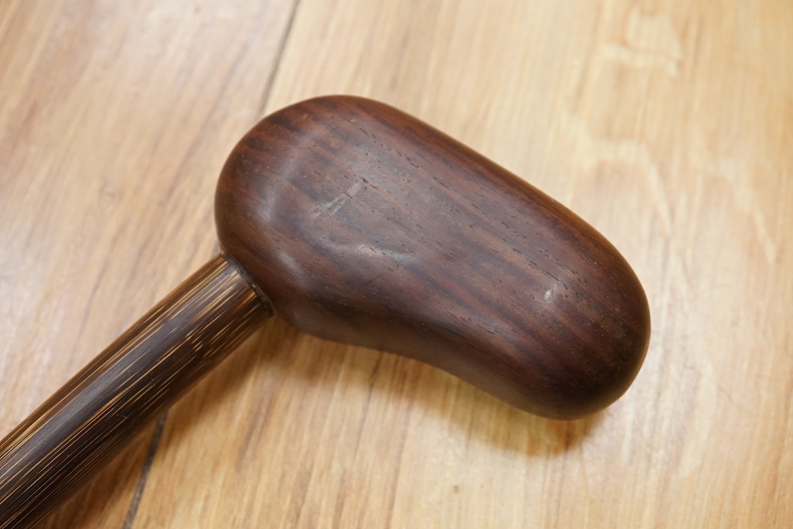 A bamboo walking stick with zitan? handle, 90cm
